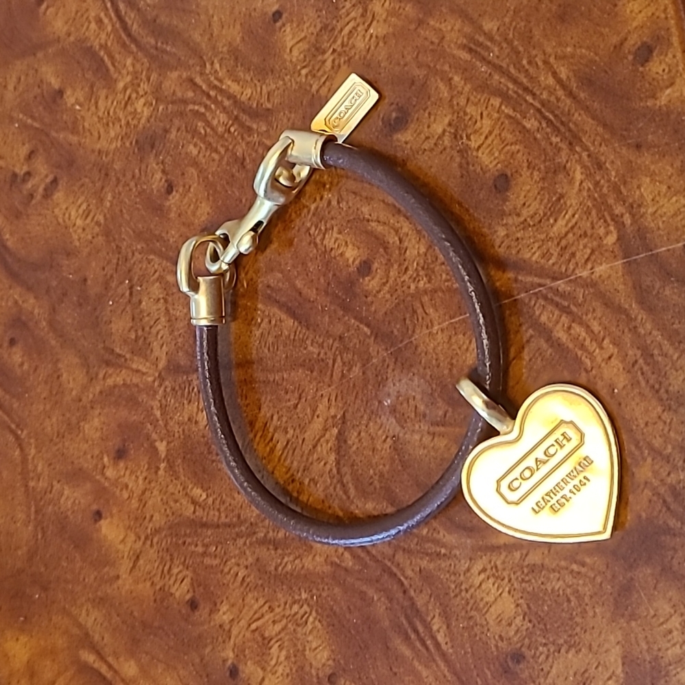 Coach leather bracelet with heart charm